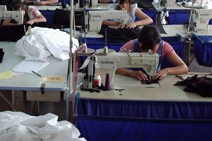 woman in edmonton working on sewing machine